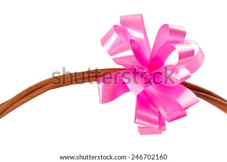 pink paper ribbon. attached to a wooden stick thin