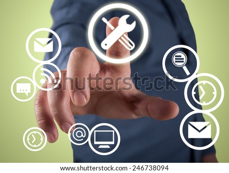 Close up of businessman touching application icon on screen