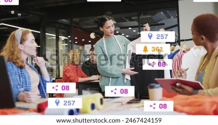 Image of social media data processing over diverse business people in office. Global social media, business, finances, computing and data processing concept digitally generated image.