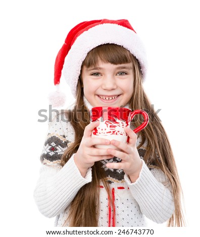happy little girl enjoying big mug of hot drink. isolated on white background