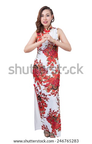 Oriental girl wishing you a happy Chinese New Year./ young beauty chinese girl. Isolated on white background.