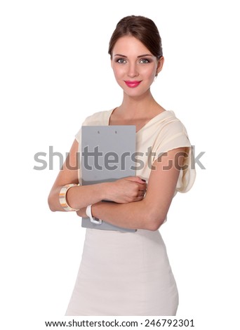 Portrait of a happy business woman holding a folder , Isolated on white background