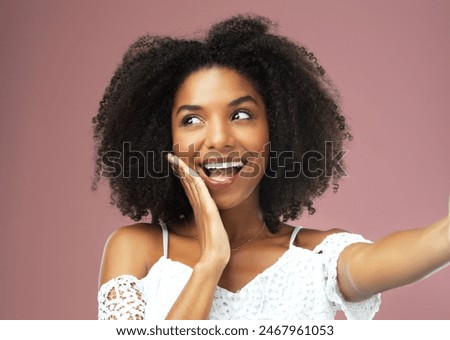 Happy, smile and selfie with influencer in studio for social media, confidence and profile picture. Photo, excited and relax with portrait of girl on pink background for beauty, self care and woman