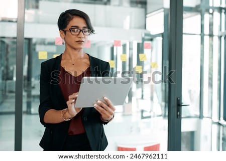 Business woman, social media app and tablet for typing, office and communication. Employee, person scrolling on work website and networking, searching and technology or internet browsing online