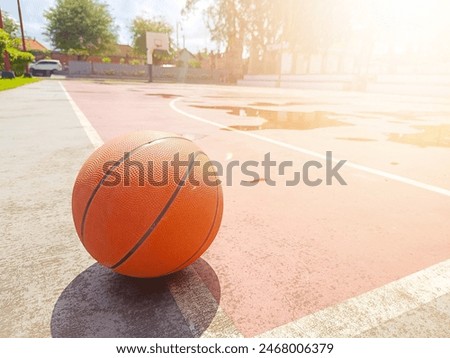 basketball in the corner of the basketball court