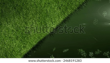 Image of clover and grass on black background. Tradition and celebration concept digitally generated image.