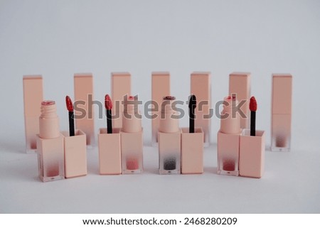 Set of colorful lipsticks or lipcream on white background, professional makeup and beauty concept