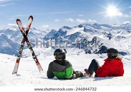 Skiers lying on snow in high mountains with cross ski, Alps Royalty-Free Stock Photo #246844732