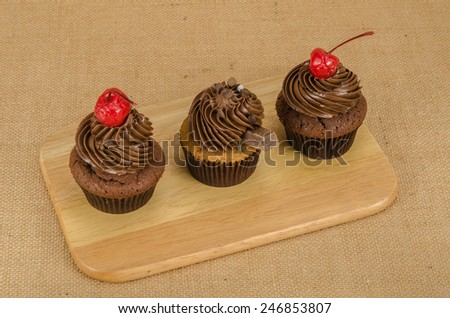 Image of cup cake on brown sack background