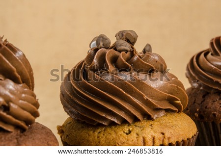 Image of cup cake on brown sack background