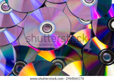 Lots of colorful discs on a pile for background use Royalty-Free Stock Photo #246866176