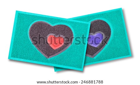 Heart door mat on white background.