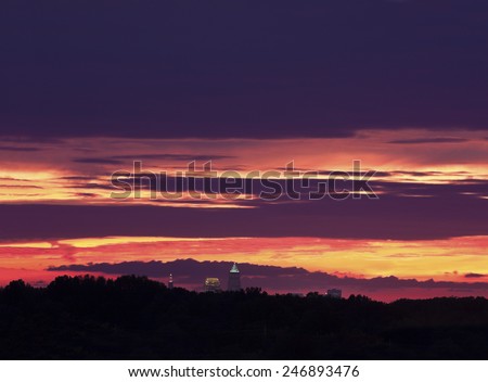 Colorful sunset over Cleveland - distant view of downtown of the city