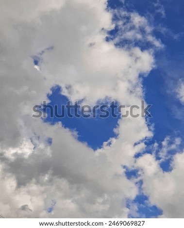 beautiful cloud love shape in the sky with blue sky background 