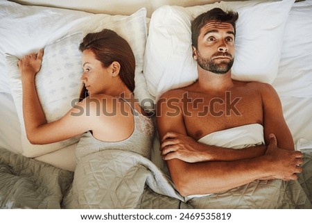 Frustrated couple, bed and fight above with breakup for erectile dysfunction, argument or disagreement at home. Top view of man and woman in toxic relationship, divorce or affair in bedroom at house