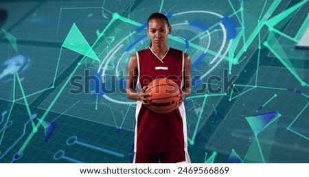 Image of basketball player holding ball over light basketball scientific basketball. Global sports competition and networking concept digitally generated image.