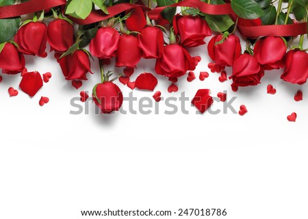 Red roses and heart shape ornaments on white background Royalty-Free Stock Photo #247018786