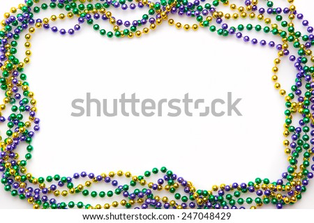 Mardi gras frame of three colours of beads 