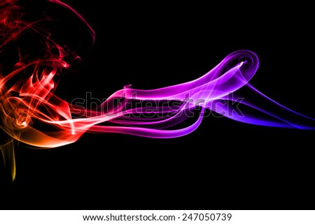Abstract colorful of smoke on black background.