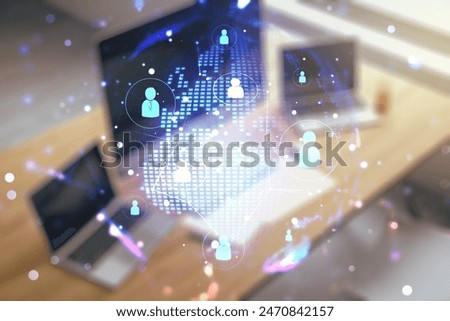 Social network media concept with world map and modern desktop with pc on background. Double exposure