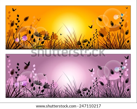 Silhouette of meadow grass and flowers on a background of the sunny sky.