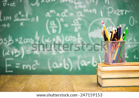 Books and blackboard, school supplies, back to school
