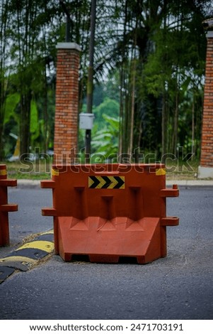 Road dividers are usually used in the middle of cross roads