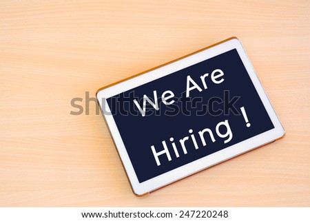 Tablet pc with text "We're hiring"