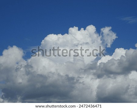 Beautiful cloudscape with white clouds and blue sky. Suitable for background