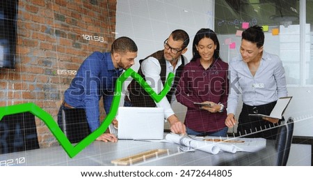 Image of financial data processing over diverse business people working in office. Global business, finances, computing and data processing concept digitally generated image.