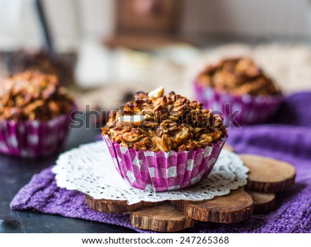 vegan oat muffins with dried fruits and nuts, healthy food Royalty-Free Stock Photo #247265368