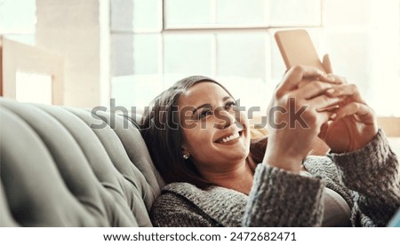 Phone, search and happy woman relax on a sofa with social media, streaming or reading subscription sign up info at home. Smartphone, app and person in a living room with online dating, chat or scroll