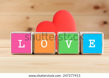 Love spelled in multicolor wooden blocks