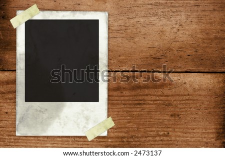 instant photo on wood plank