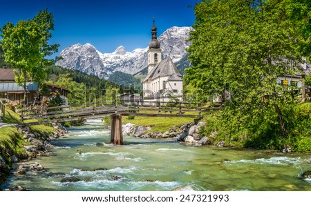 Scenic mountain landscape in the Bavarian Alps with famous Parish Church of St. Sebastian in the village of Ramsau, Nationalpark Berchtesgadener Land, Upper Bavaria, Germany Royalty-Free Stock Photo #247321993