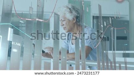 Image of financial data processing over senior african american woman using smartphone. Global business, finances and digital interface concept digitally generated image.