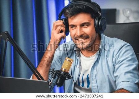 Host channel of creative broadcasters advice for problem in live with listeners by positive thinking. In casual wearing headsets and mic talking in social media and radio at comfy workplace. Sellable.