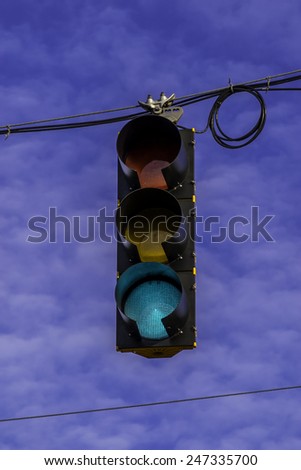 The hanging street light signal.