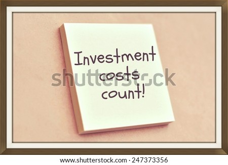 Text investment costs count on the short note texture background