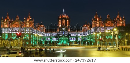 Chhatrapati Shivaji Terminus (CST) formerly Victoria Terminus in Mumbai, India is a UNESCO World Heritage Site with colourful lighting of Indian flag on Republic Day, the HQ of the Central Railway. Royalty-Free Stock Photo #247392619
