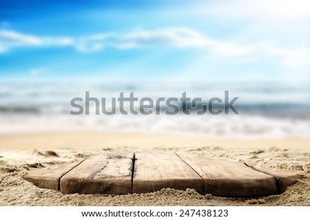sand space and desk of wood 