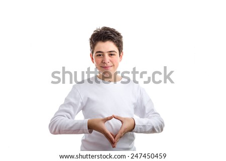 Caucasian boy with acne-prone skin in a white long sleeved t-shirt  smiling makes reverse hand steeple gesture