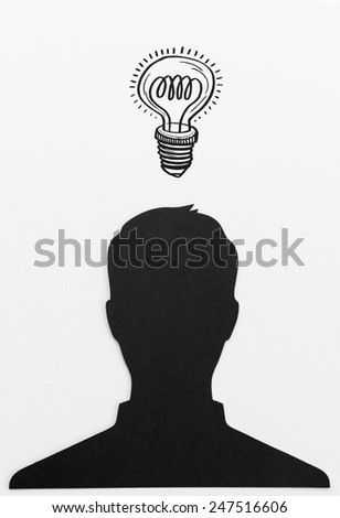 Head silhouette with bulb above