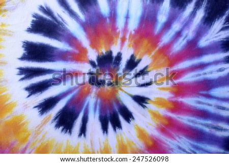 colorful tie dyed pattern on cotton fabric for background. 