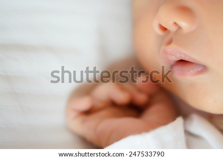 Close-up beautiful sleeping baby girl Royalty-Free Stock Photo #247533790