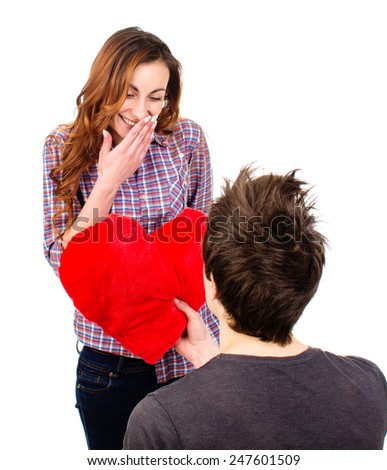 an image of guy doing a girl's marriage proposal isolated on white