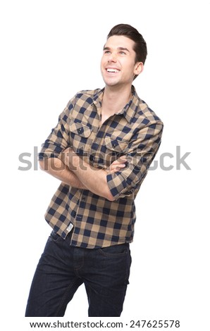Portrait of a happy young man smiling with arms crossed on isolated white background 