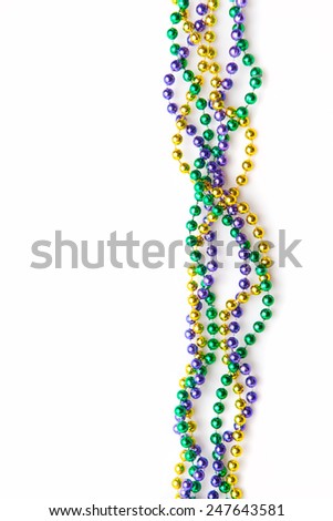 Mardi gras of three colours of beads