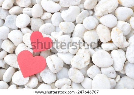 heart symbol on white stone background