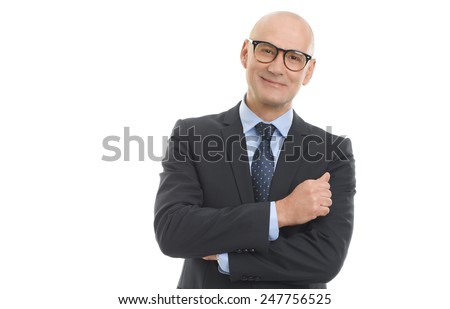 Portrait of senior sales man standing against white background. 